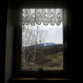 IMG 6295 Vodole-vinotoč Mak-pogled skozi okno proti Pohorju